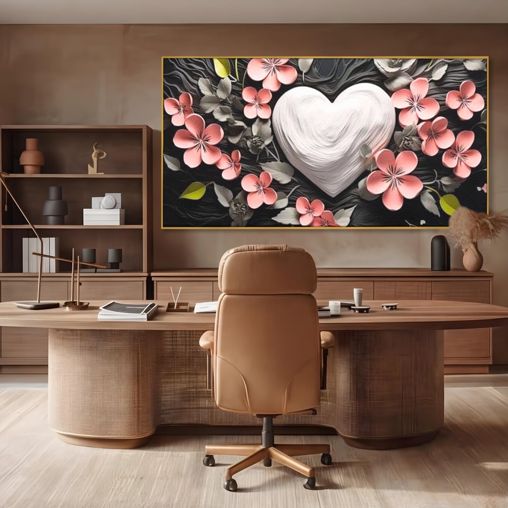 Tablou canvas cu tablou canvas cu inima alba si flori roz, in rama de aluminiu auriu, pe perete intr-un birou